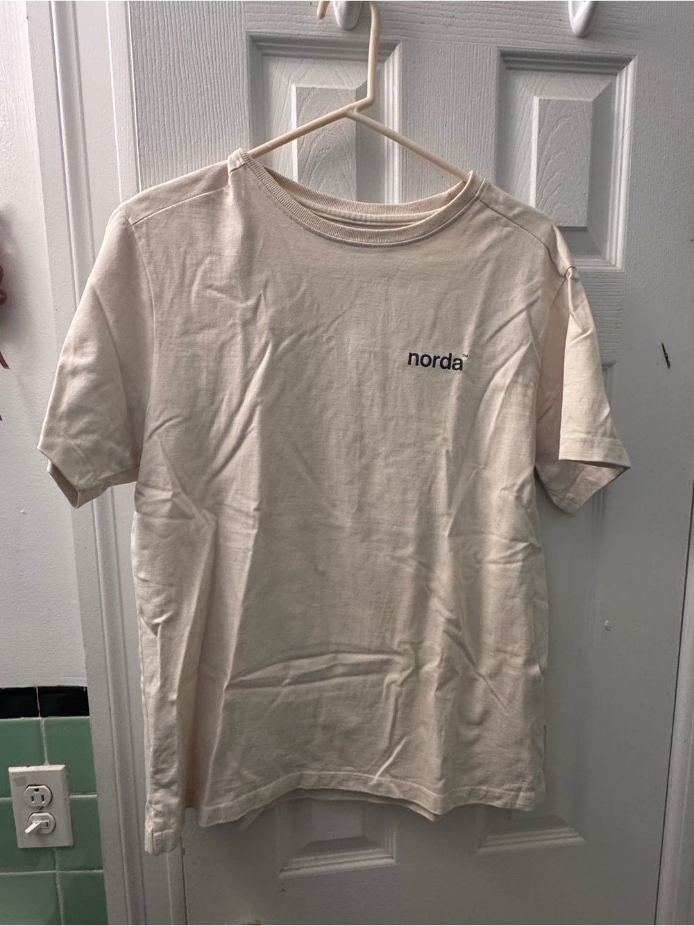 NORDA Cream Short Sleeve Tee with Small 'norda' Chest Logo